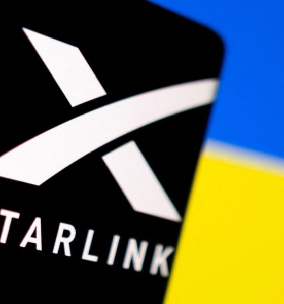 Illustration shows Starlink logo and Ukraine flag