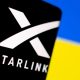 Illustration shows Starlink logo and Ukraine flag