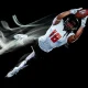 american football player man isolated black background light painting