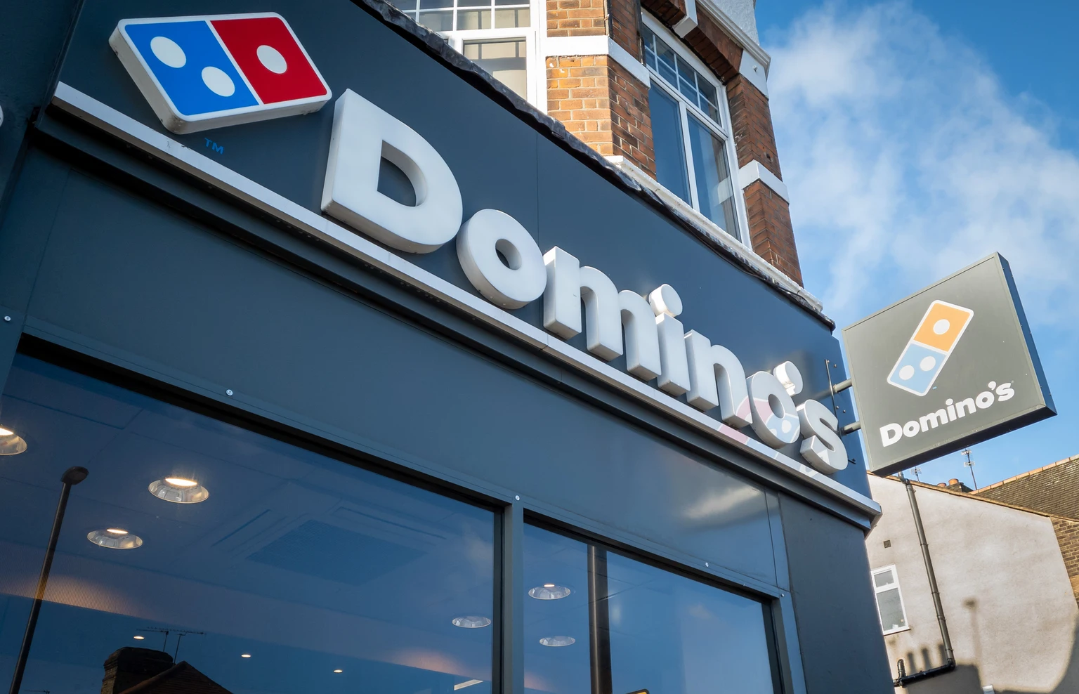Domino's Pizza Group: Market Leader Trading Near Record-High Dividend Yield (DPUKY)