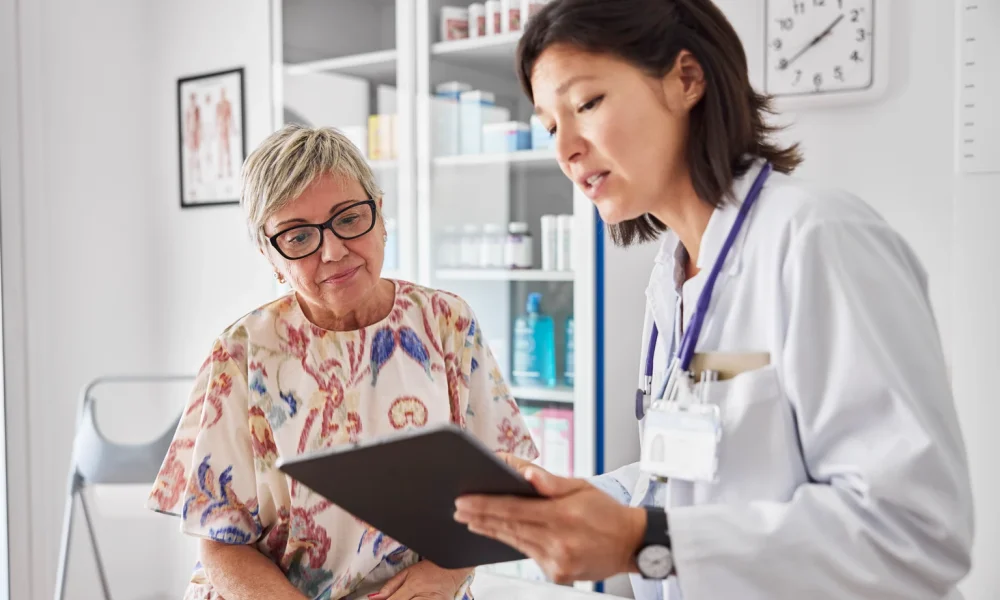 Doctor sharing medical results with woman