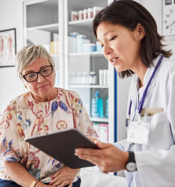 Doctor sharing medical results with woman