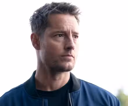 Justin Hartley as Colter Shaw standing outside and looking off to the left in Season 3 of Tracker
