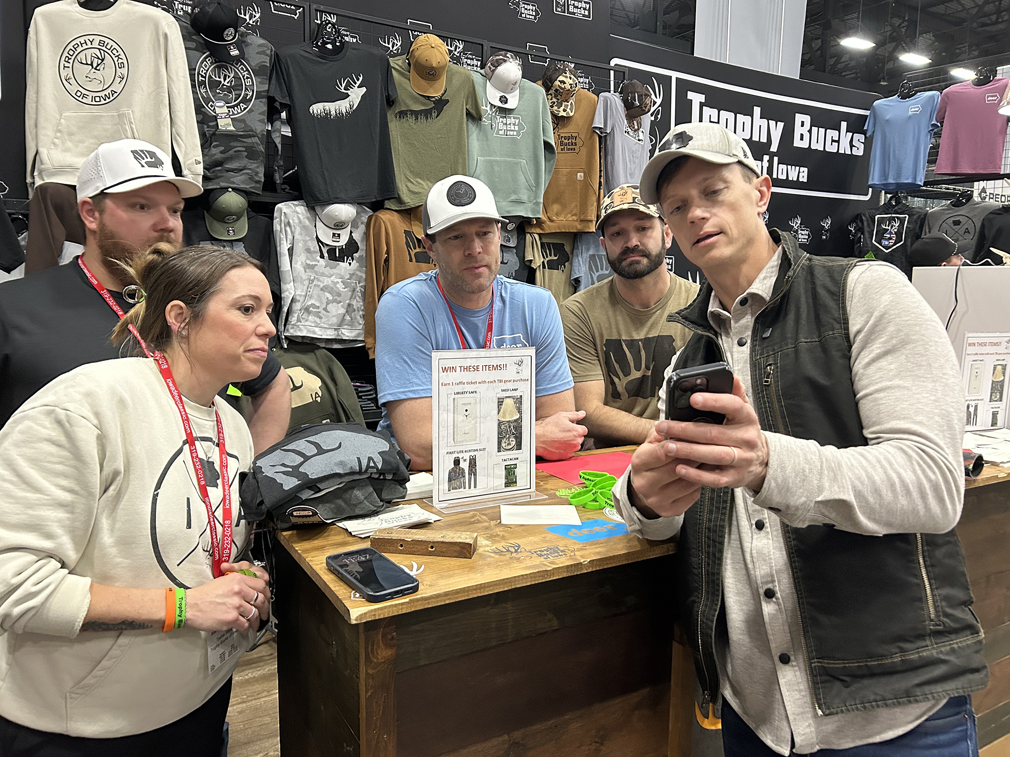 Rob Sand engages with fellow hunters at the Iowa Deer Classic.