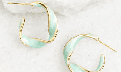 gold-plated hoops with mint enamel and twisted details