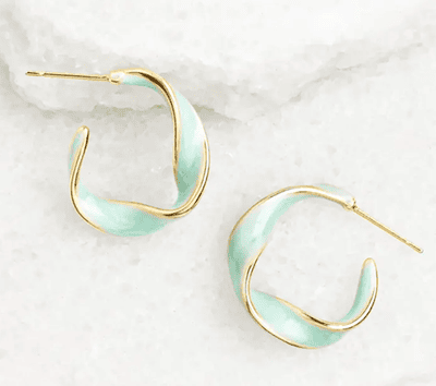 gold-plated hoops with mint enamel and twisted details