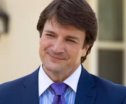 Nathan Fillion smiling in Santa Clarita Diet
