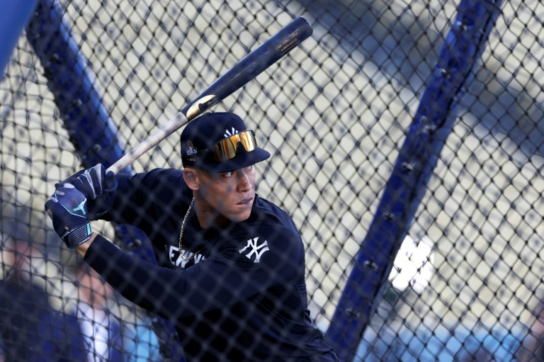 New York Yankees captain Aaron Judge warms up at Dodger Stadium ahead of Friday's opener