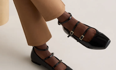 black ballet flat with three straps