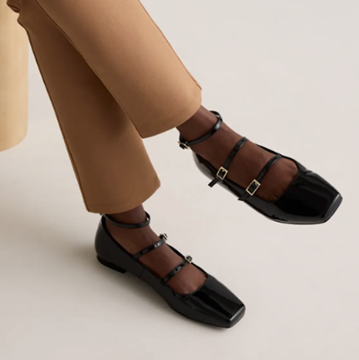 black ballet flat with three straps