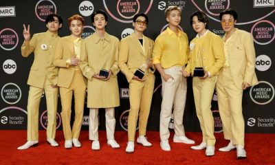 Shares in the management agency behind K-Pop band BTS plunged 27 percent after the group announced they were taking an indefinite break