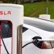 Tesla has almost halved the cost of leasing its electric cars in Britain, in a bid to reverse sliding sales and shore up its market share against fast-growing Chinese competitors.