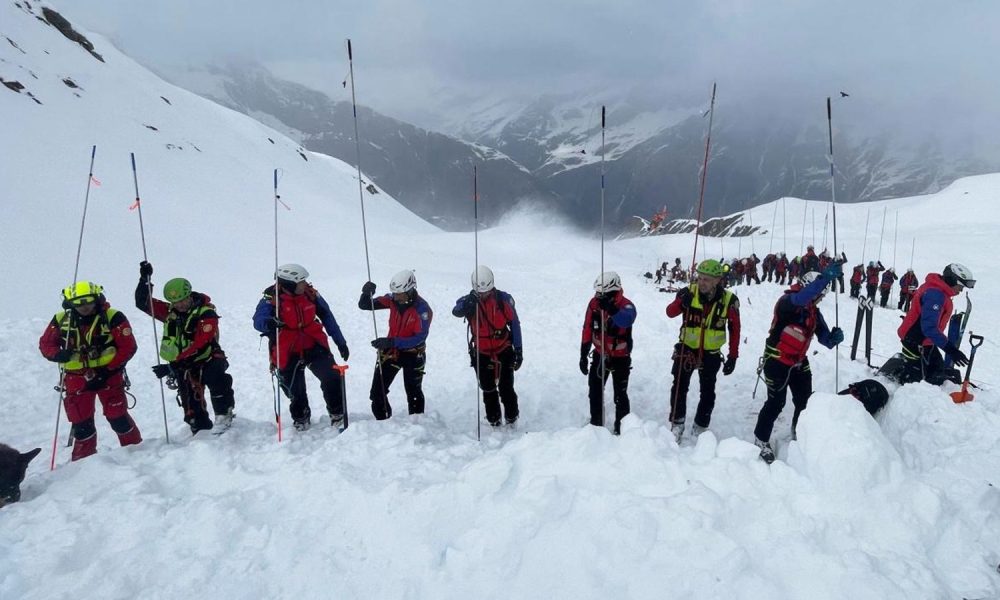 Rescuers search the site of the avalanche in Val Ridanna, in Alto Adige, northern Italy. Pic: Italian Alpine, National Alpine & CNSAS/AP