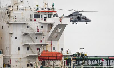 A French Navy helicopter hovers over the Deyna before it is boarded. Pic: Reuters