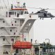 A French Navy helicopter hovers over the Deyna before it is boarded. Pic: Reuters
