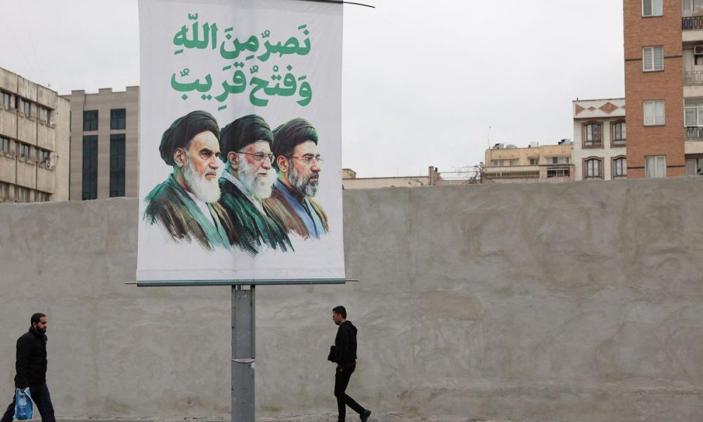 A banner depicts Iran's new supreme leader, Mojtaba Khamenei, alongside his predecessors. Pic: Reuters