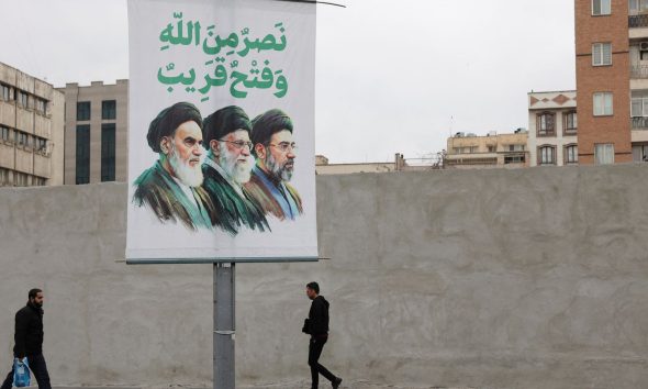 A banner depicts Iran's new supreme leader, Mojtaba Khamenei, alongside his predecessors. Pic: Reuters