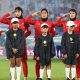 The Iranian team during their national anthem before the match with the Philippines on Sunday. Pic: Dave Hunt/AAP Image via AP