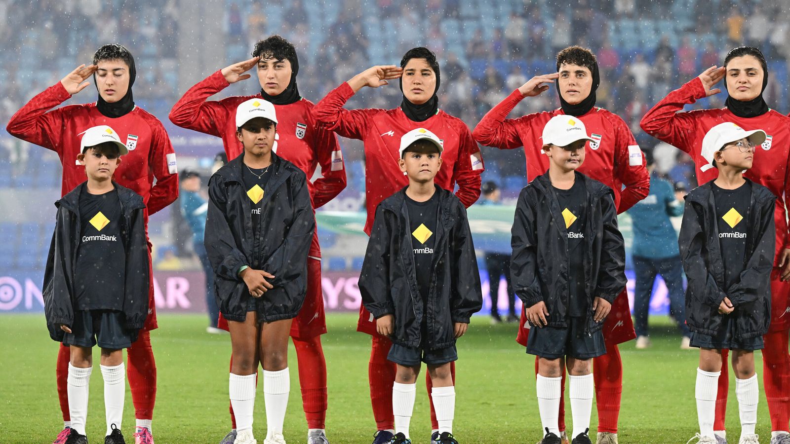 The Iranian team during their national anthem before the match with the Philippines on Sunday. Pic: Dave Hunt/AAP Image via AP