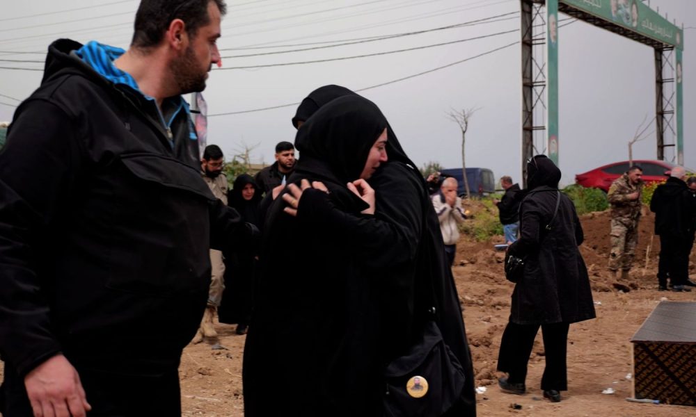 Some weep while others stare blankly at makeshift cemetery in Lebanon's evacuation zone | World News