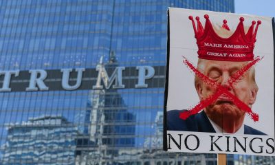 An anti-Trump banner during a protest in Chicago. Pic: Reuters