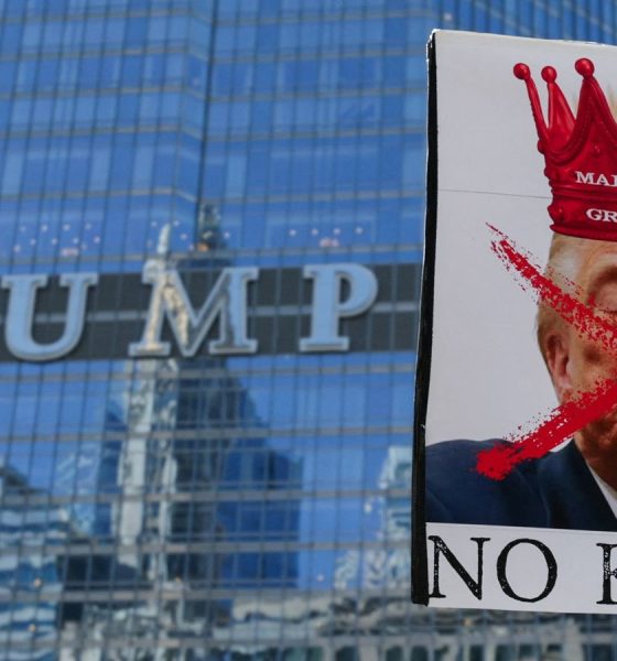 An anti-Trump banner during a protest in Chicago. Pic: Reuters
