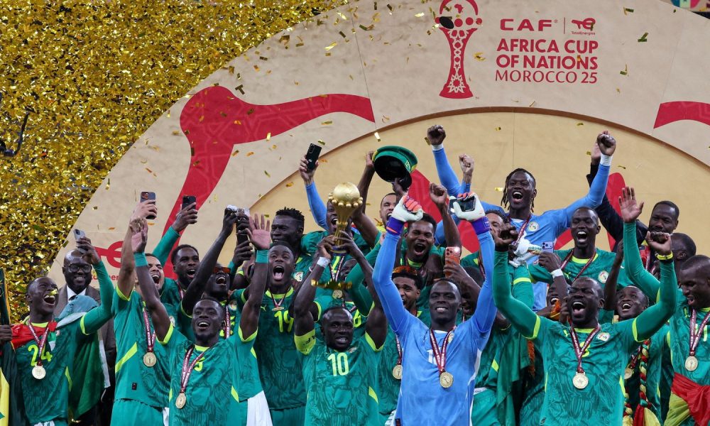 Senegal's Sadio Mane lifts the trophy with teammates as they celebrate after winning the Africa Cup of Nations. Pic: Reuters