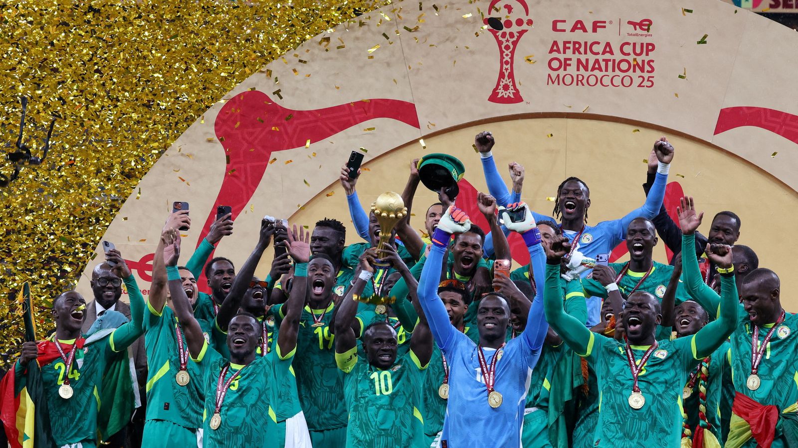 Senegal's Sadio Mane lifts the trophy with teammates as they celebrate after winning the Africa Cup of Nations. Pic: Reuters