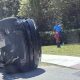 Tiger Woods standing near his overturned vehicle in Jupiter Island, Florida. Pic: AP