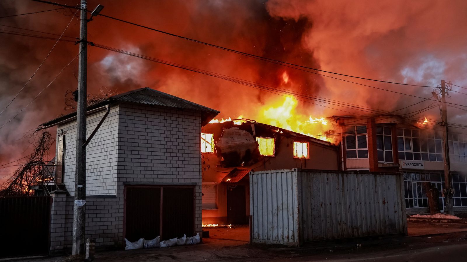 A blaze after strikes in the town of Brovary, Kyiv region. Pic: Reuters