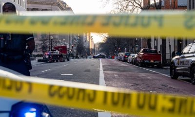 Police block streets around the White House. Pic: AP