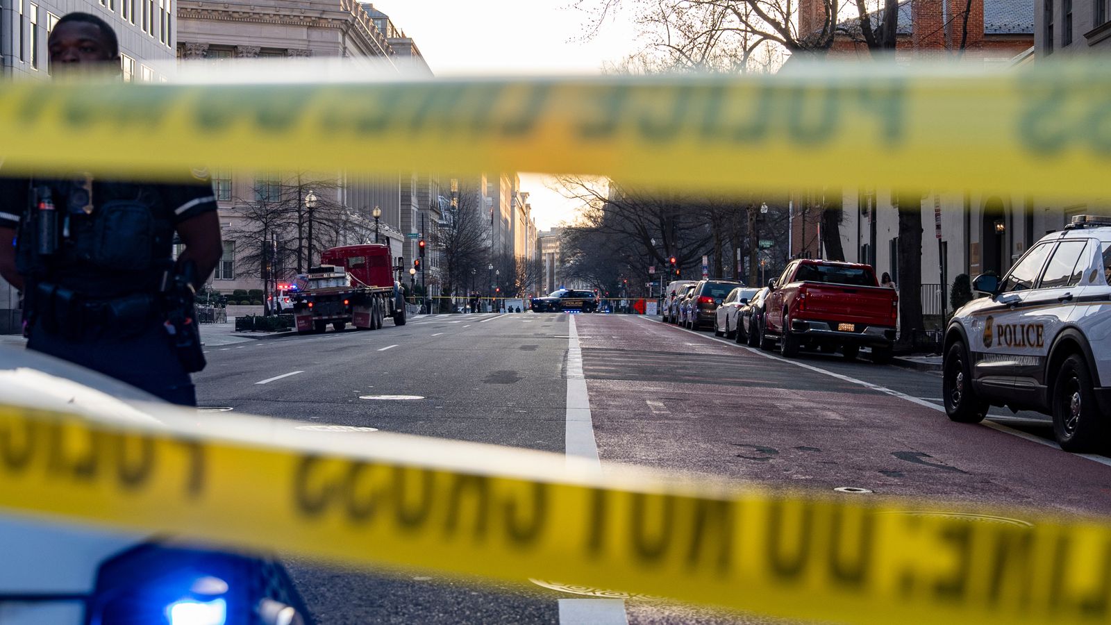 Police block streets around the White House. Pic: AP