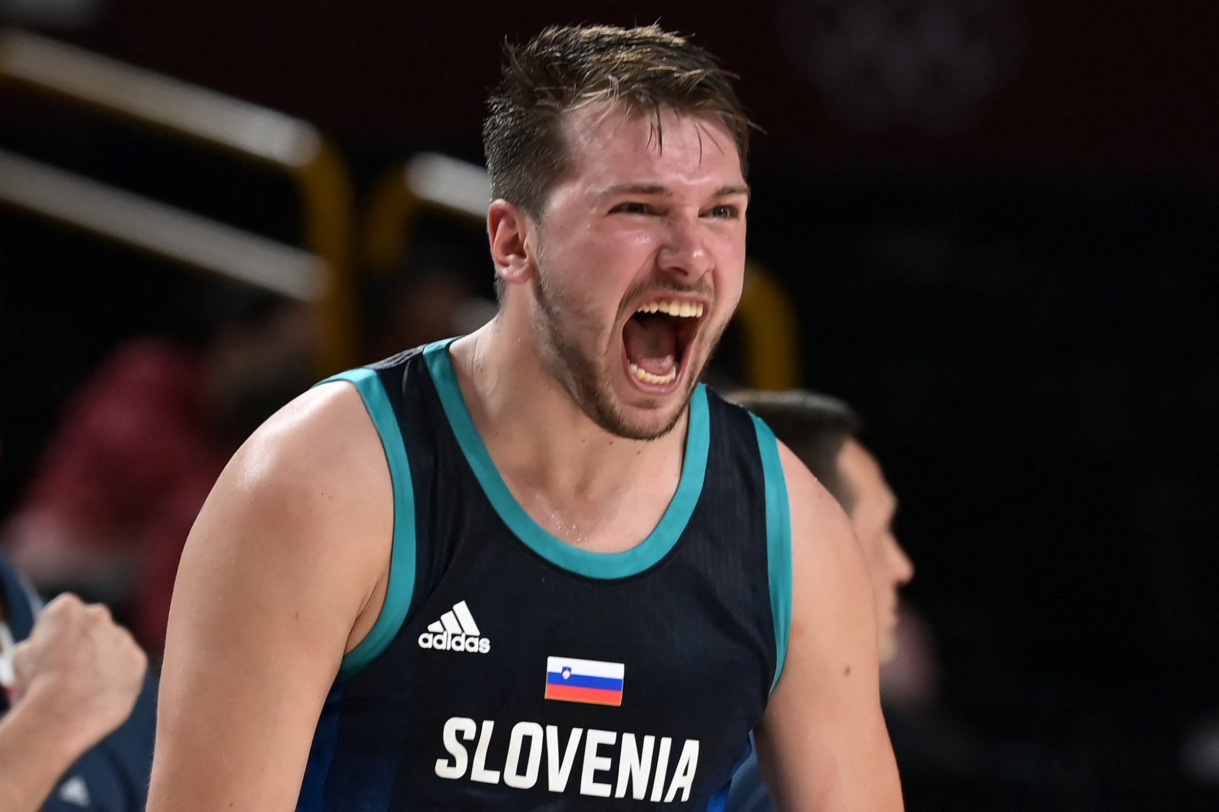 Slovenia's Luka Doncic reacts after a point in the men's semi-final basketball match between France and Slovenia during the Tokyo 2020 Olympic Games at the Saitama Super Arena in Saitama on August 5, 2021.