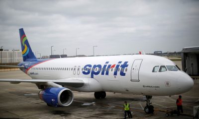 A Spirit Airlines Airbuys A320-200 airplane sits at a gate at the O'Hare Airport in Chicago, Illinois October 2, 2014.