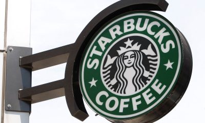 The Starbucks sign is seen outside one of its stores in New York