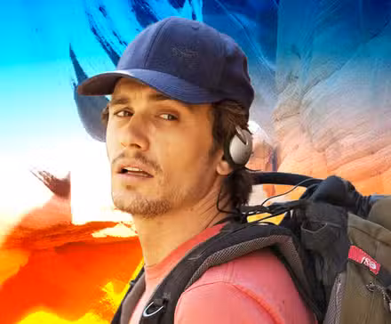 Feature image of James Franco in front of red, yellow and blue cliffs in 127 Hours