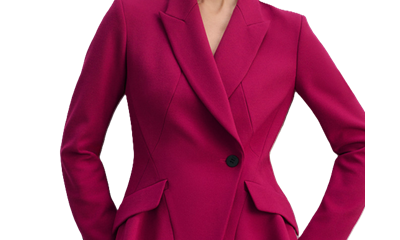 woman wears dark hot pink suit