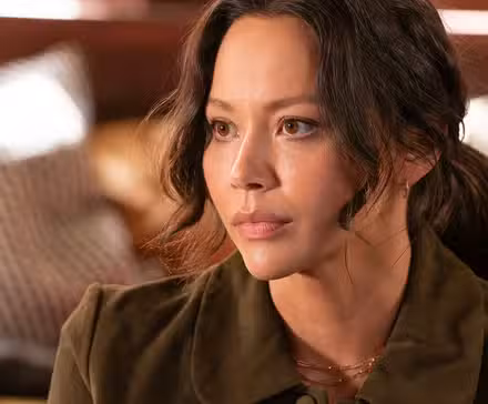 Melissa O'Neil as Lucy Chen sits in her room in The Rookie Season 8