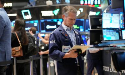 Stock markets shudder worldwide after oil prices briefly spike to nearly $120 per barrel