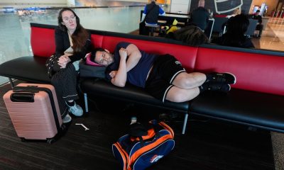 Some flight cancellations and delays continue after US storms dump snow in the Midwest and head east