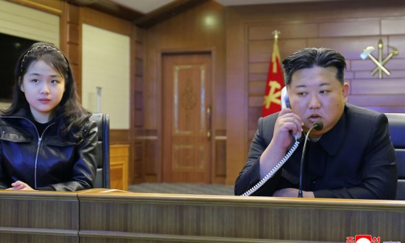 Kim and his daughter watch North Korea's latest missile tests