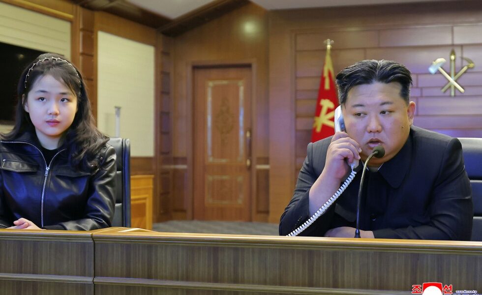 Kim and his daughter watch North Korea's latest missile tests