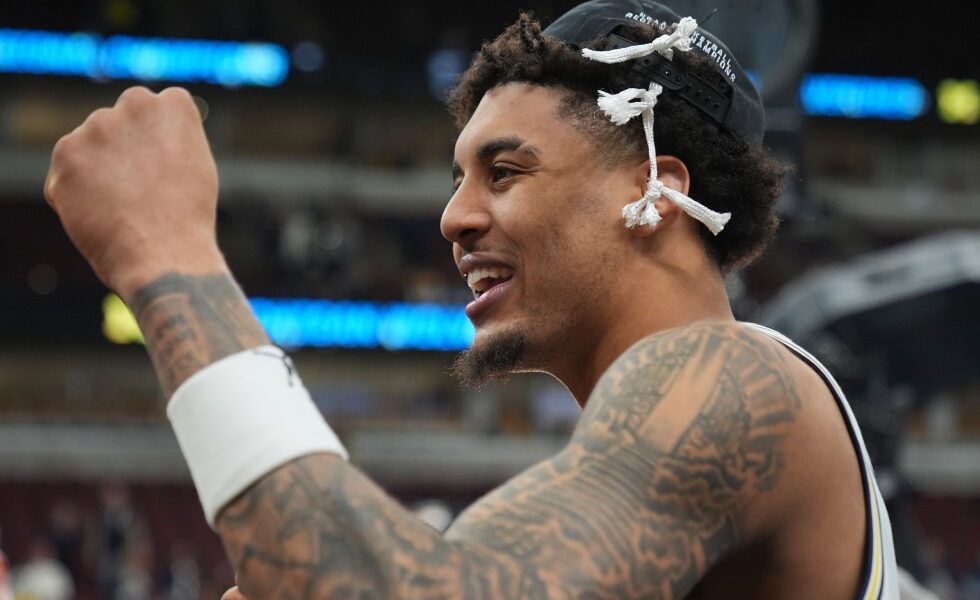 Lendeborg stars as Michigan rolls past Tennessee and into Final Four