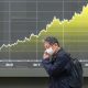 Asian shares decline as oil back to above $100 a barrel