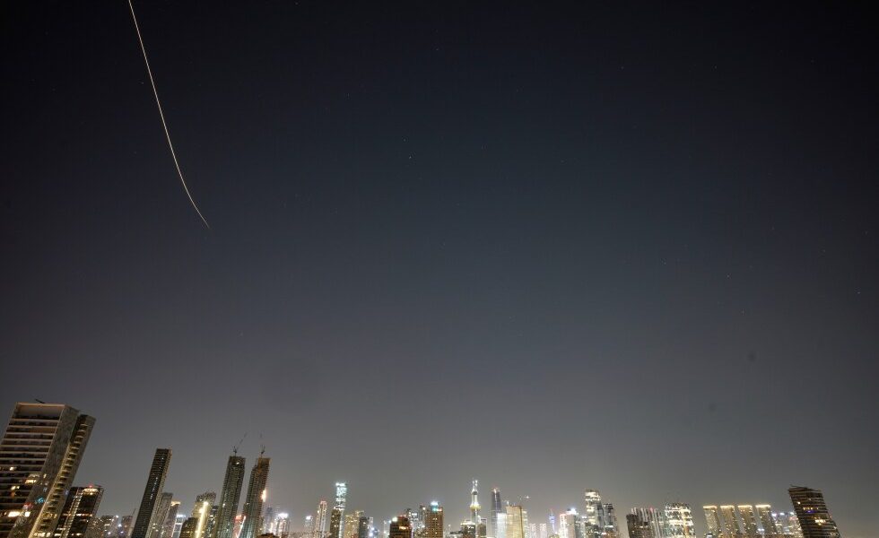 Iran targets Israel and Gulf Arab states even as Trump says US is in talks to end the war