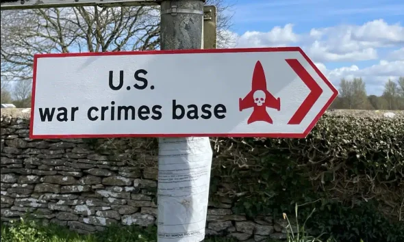 Signs to 'US war crimes base' appear in Fairford, Gloucestershire