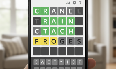 Air travellers wearing a protective face masks, amid the coronavirus disease (COVID-19) pandemic, at JFK International airport in New York