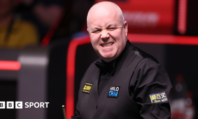 John Higgins grimaces