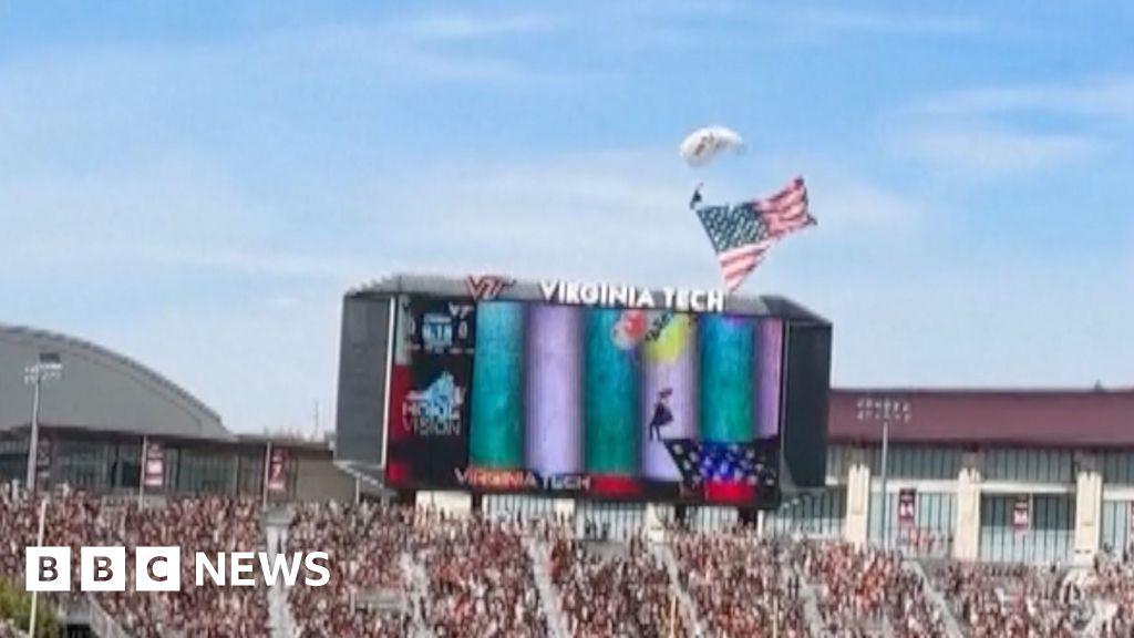 Skydiver crashes into jumbotron at US football game