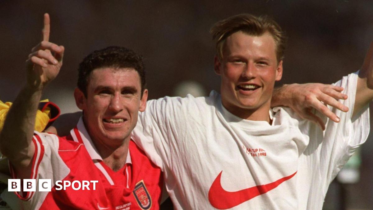 Martin Keown (left) and Alex Manninger celebrate together at Wembley after Arsenal's FA Cup final win over Newcastle in 1998
